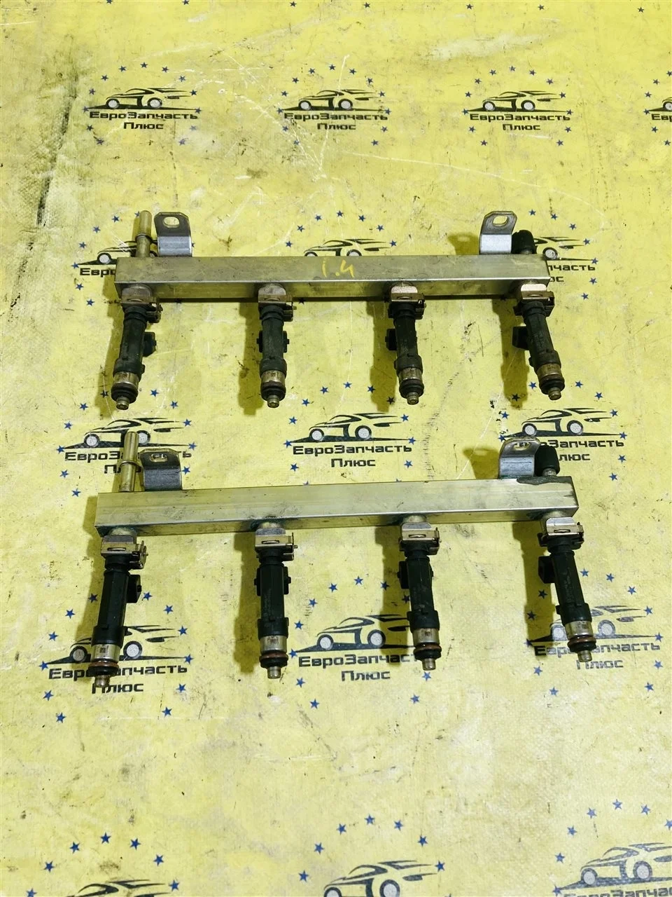 Рампа топливная с форсунками Opel Astra 55572731 J A14XER