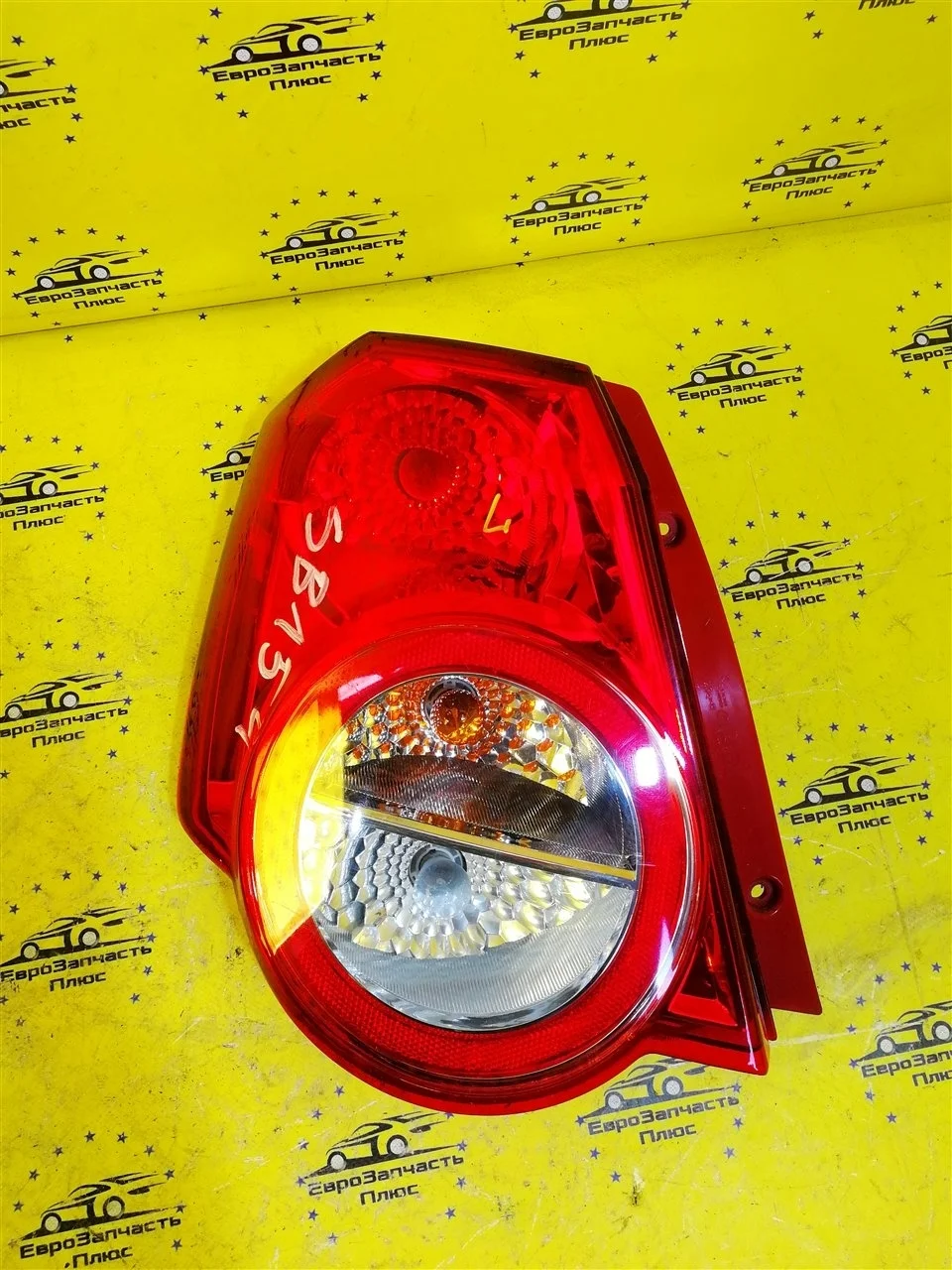 Фонарь Chevrolet Aveo 96830975 T255, задний левый