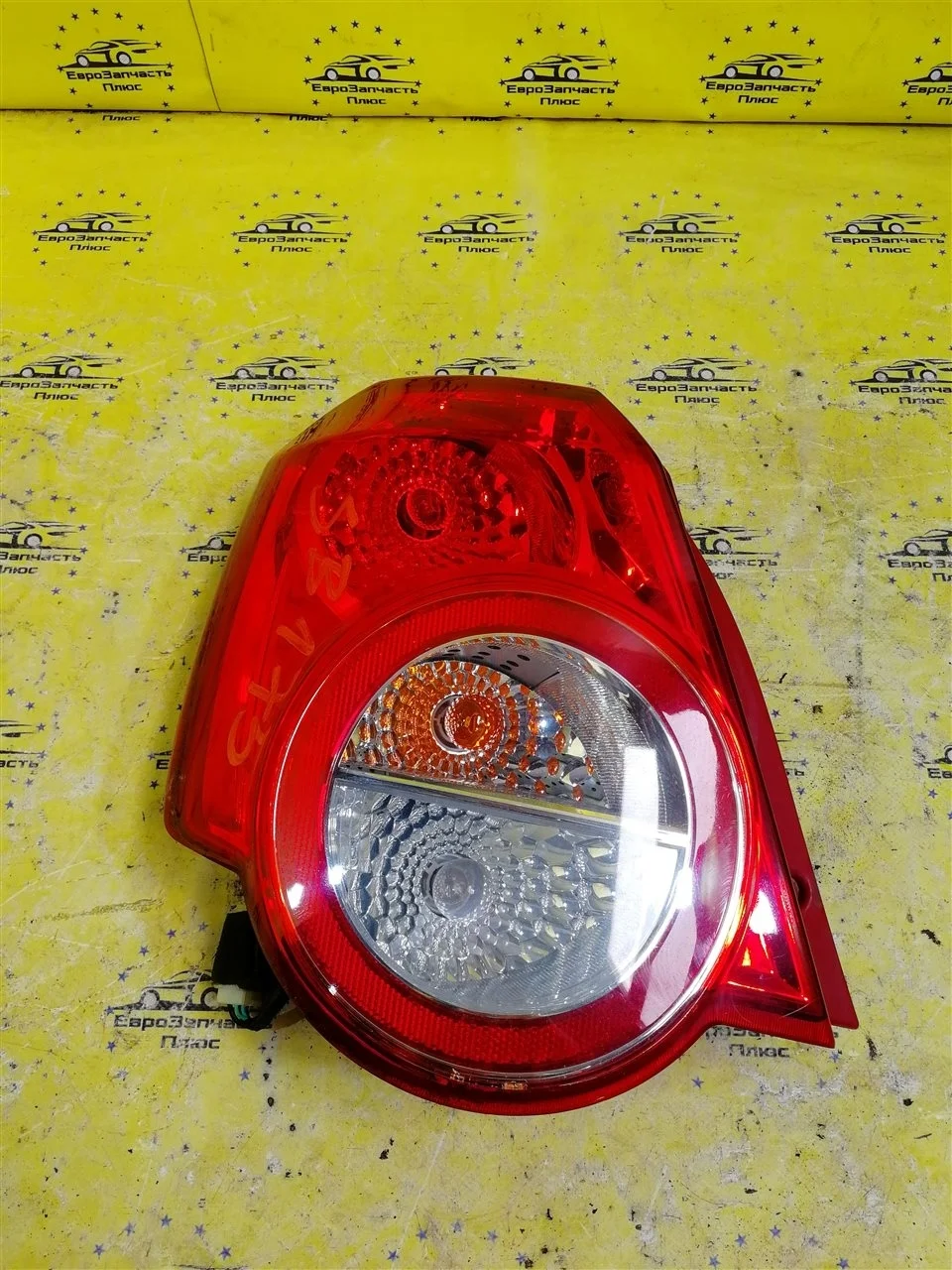 Фонарь Chevrolet Aveo 96830975 T255, задний левый