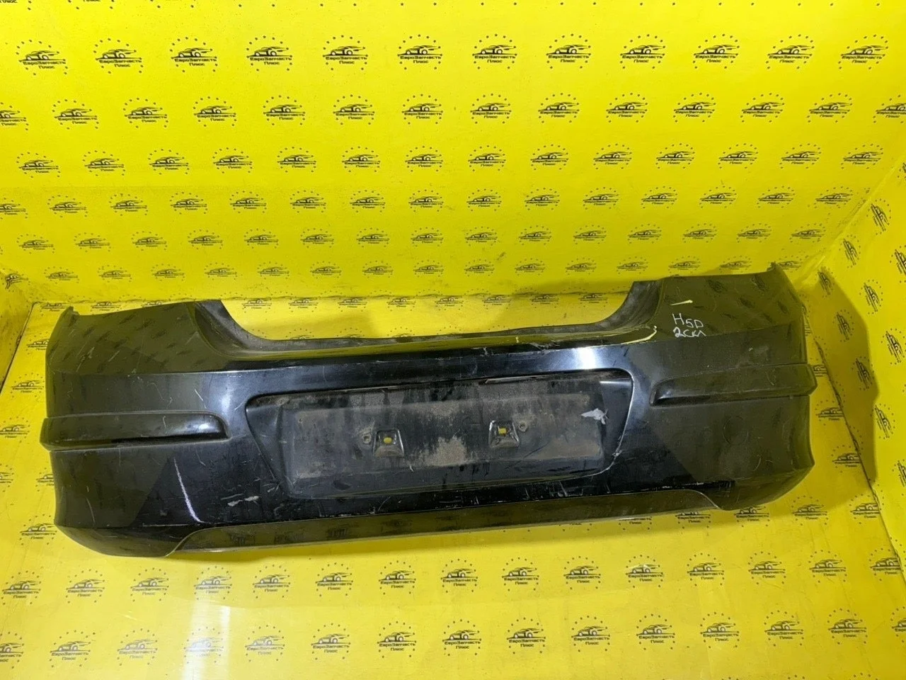 Бампер Opel Astra 24460353 H, задний