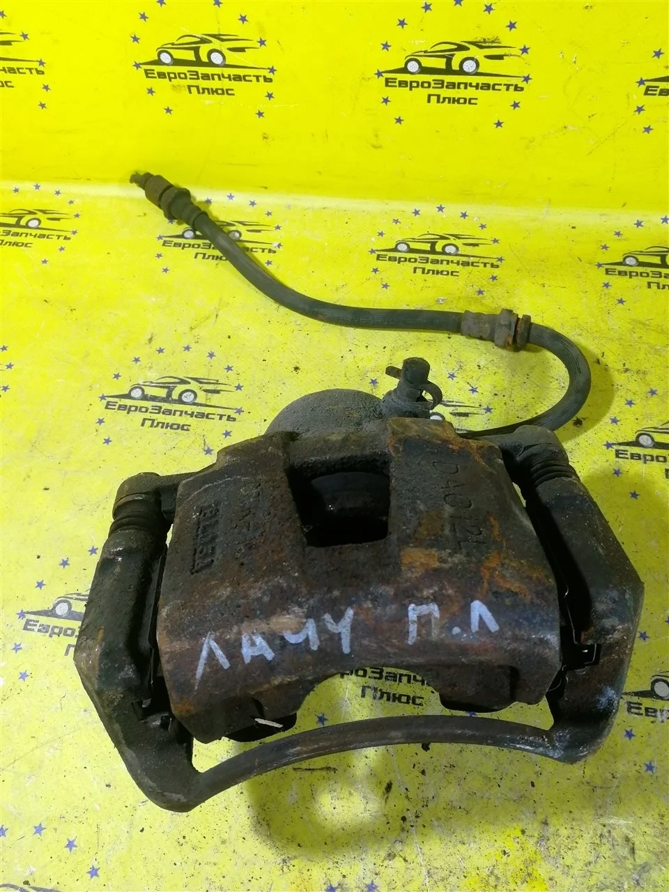 Суппорт Chevrolet Lacetti 96549788 J200, передний левый