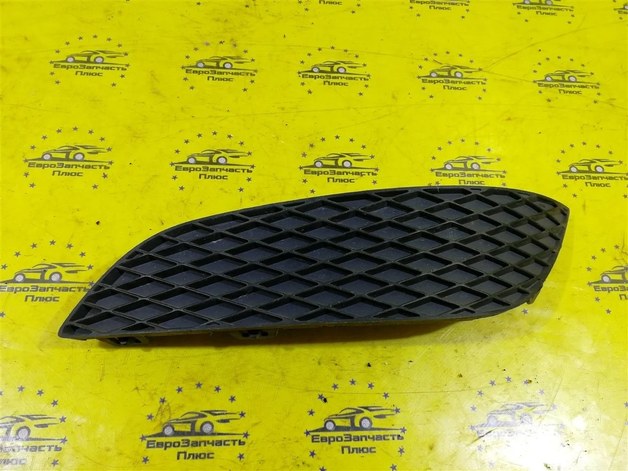 Заглушка бампера Opel Astra 13225762 H, передняя левая