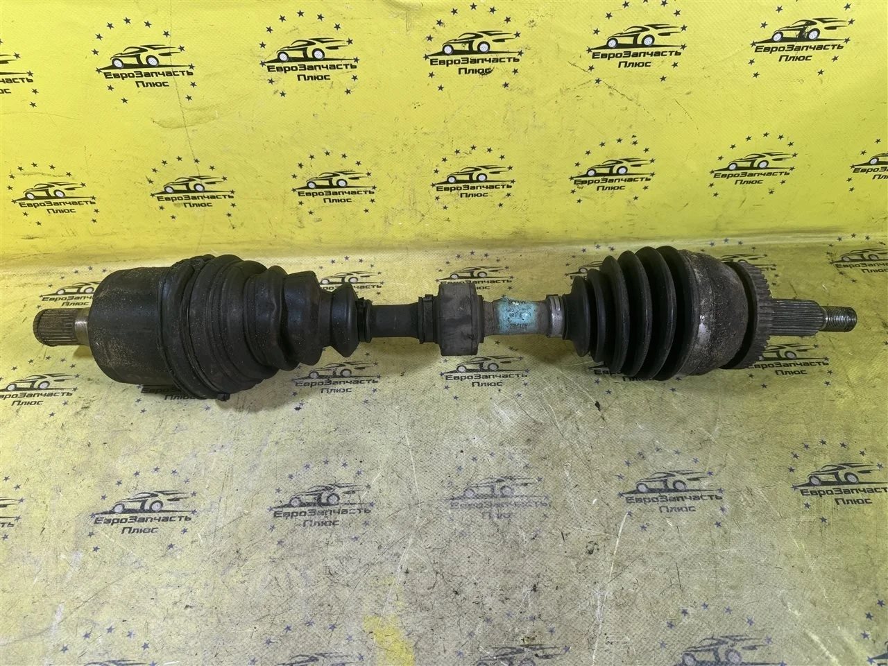 Привод Hyundai Santa Fe 2 495002B700 CM, передний левый