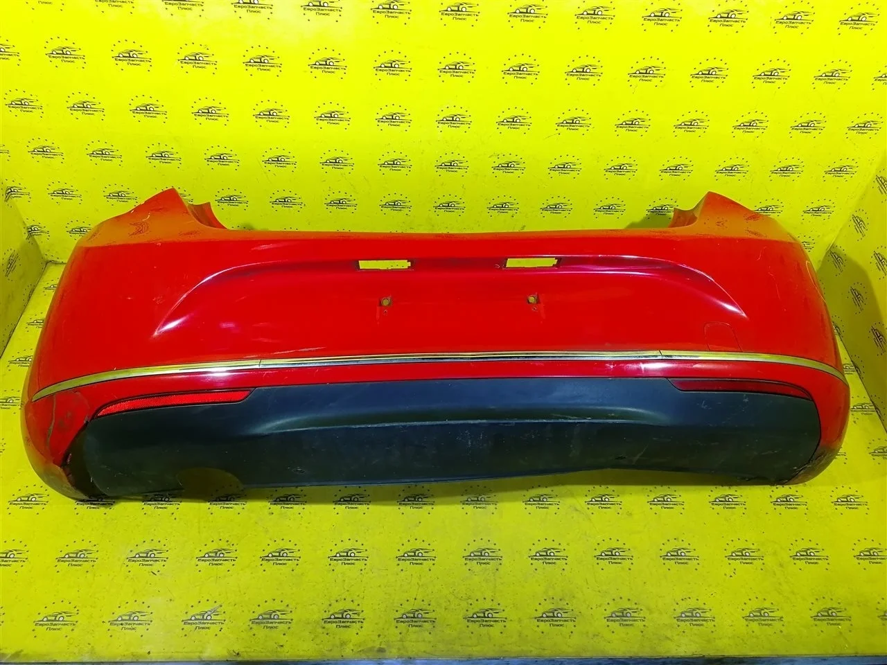 Бампер Opel Astra 13368066 J, задний