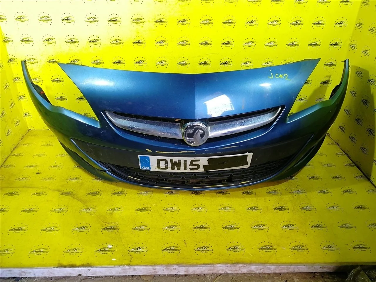 Бампер Opel Astra 13368660 J, передний