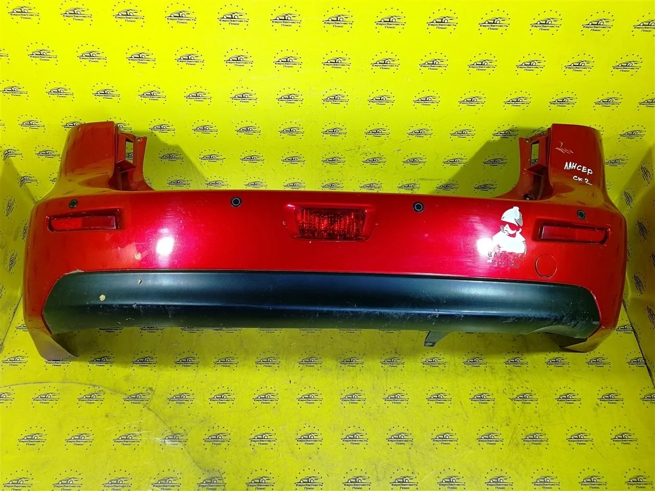 Бампер Mitsubishi Lancer 6410B001 10, задний