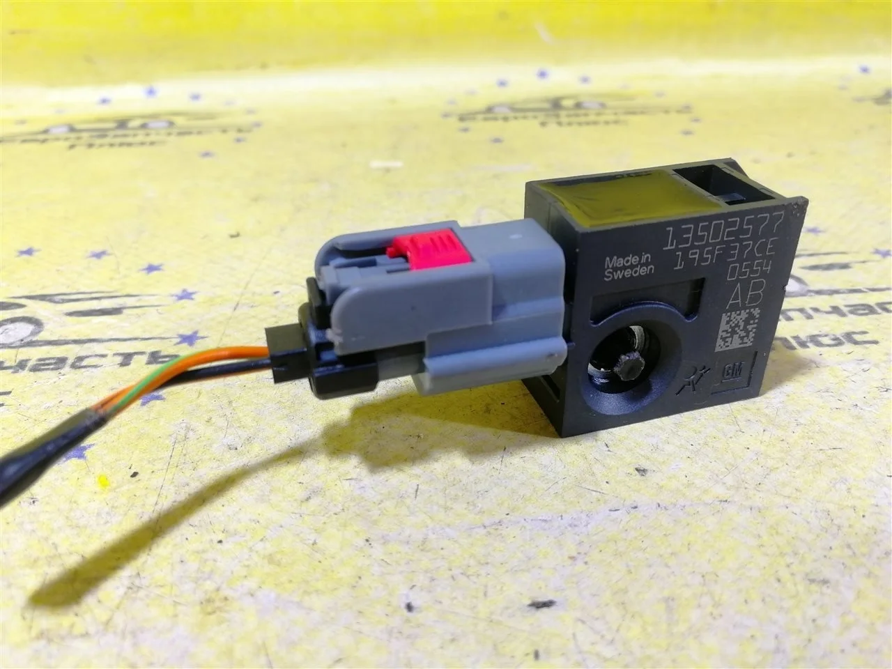 Датчик удара Opel Zafira 13502577 C