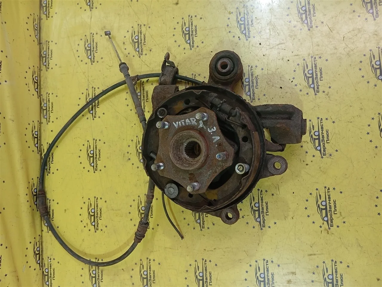 Кулак Suzuki Grand Vitara 2 4615065J00 JT, задний левый