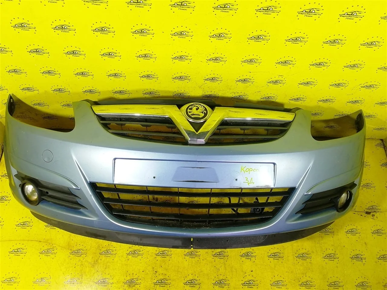 Бампер Opel Corsa 13211462 D, передний