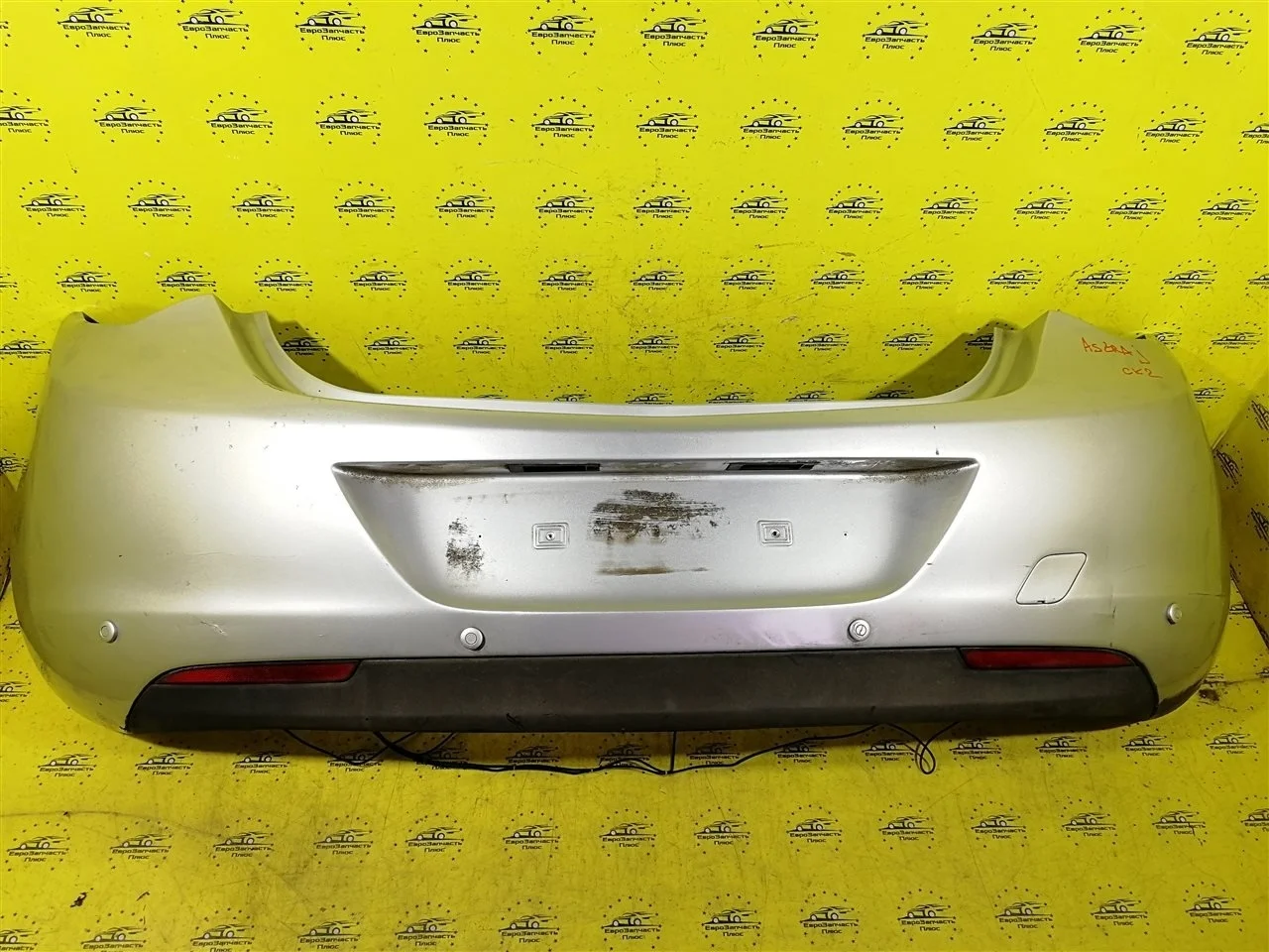 Бампер Opel Astra 13266587 J, задний