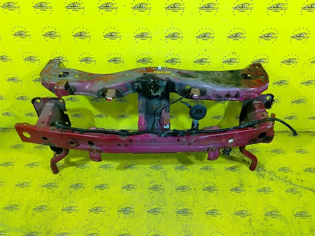 Усилитель бампера Mitsubishi Lancer 6400C005 CY, передний