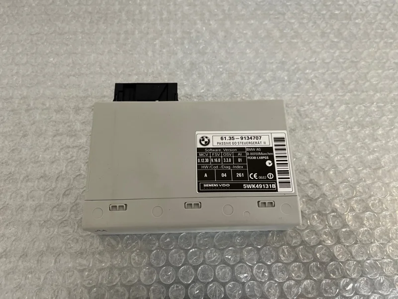 Блок управления бесключевым доступом BMW X5 2011 61359134707 E70 N63B44A
