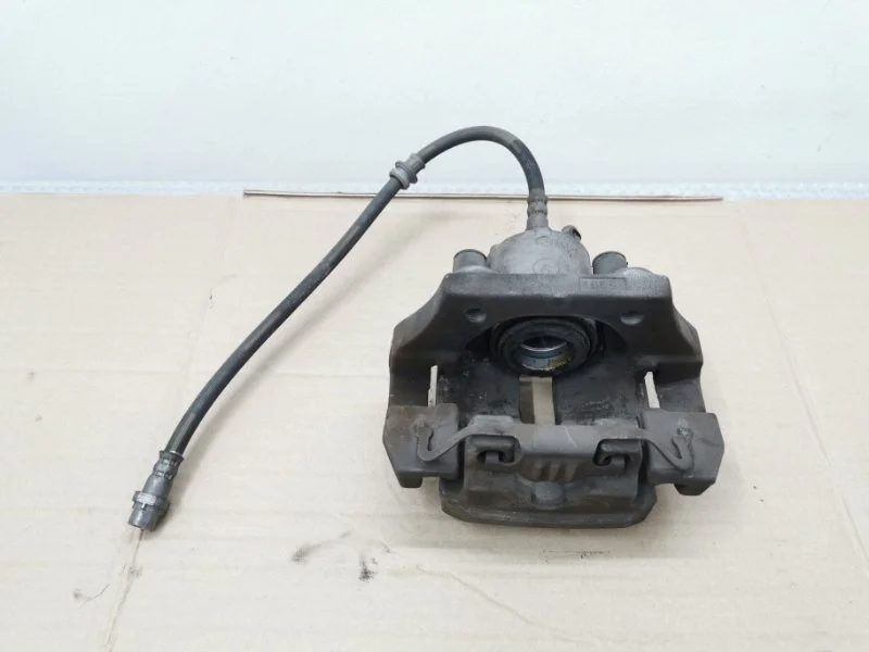 Суппорт тормозной BMW X5 2010 34216776787 E70 N55B30, задний левый