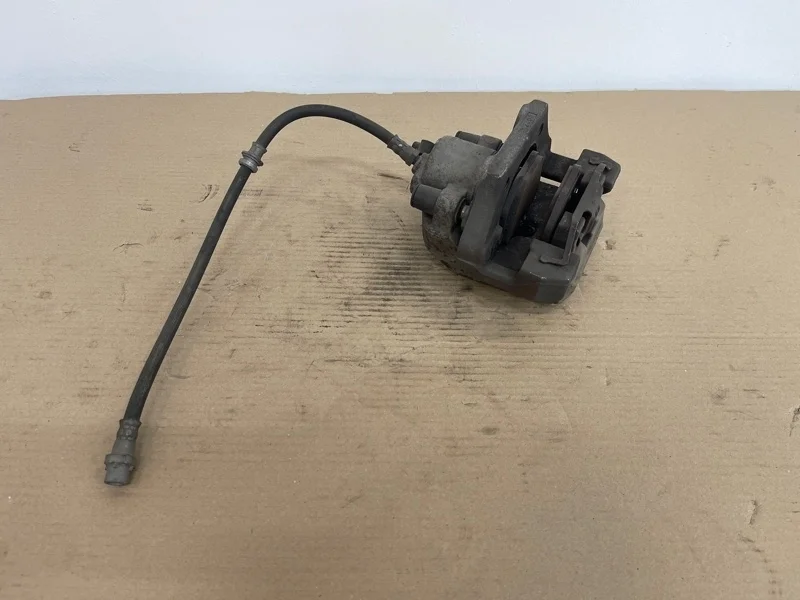 Суппорт тормозной BMW X5 2012 34216776787 E70 N55B30, задний левый