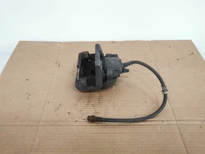 Суппорт тормозной BMW X5 2012 34216776787 E70 N55B30, задний левый