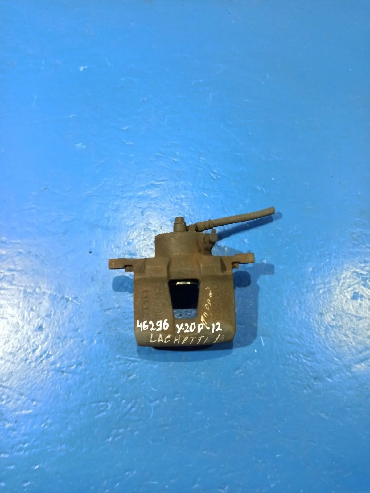 Суппорт тормозной передний левый Chevrolet Lacetti I (2004—2013)