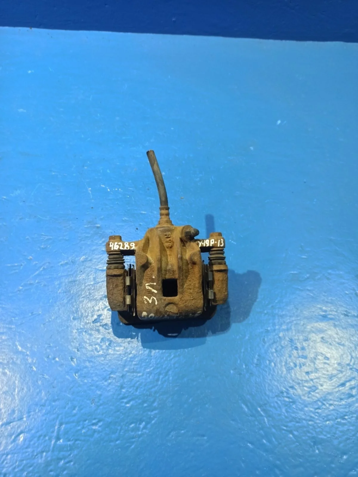 Суппорт тормозной задний левый Hyundai Sonata IV рестайлинг (2001—2012)