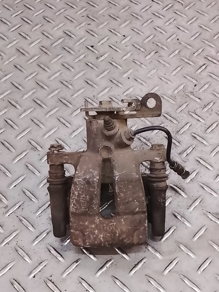 Суппорт тормозной Renault Megane 2005 7701049108 2, задний левый