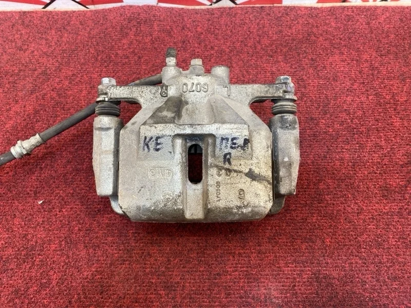 Тормозной суппорт Mazda Cx-5 K0Y13398Z KE, передний правый