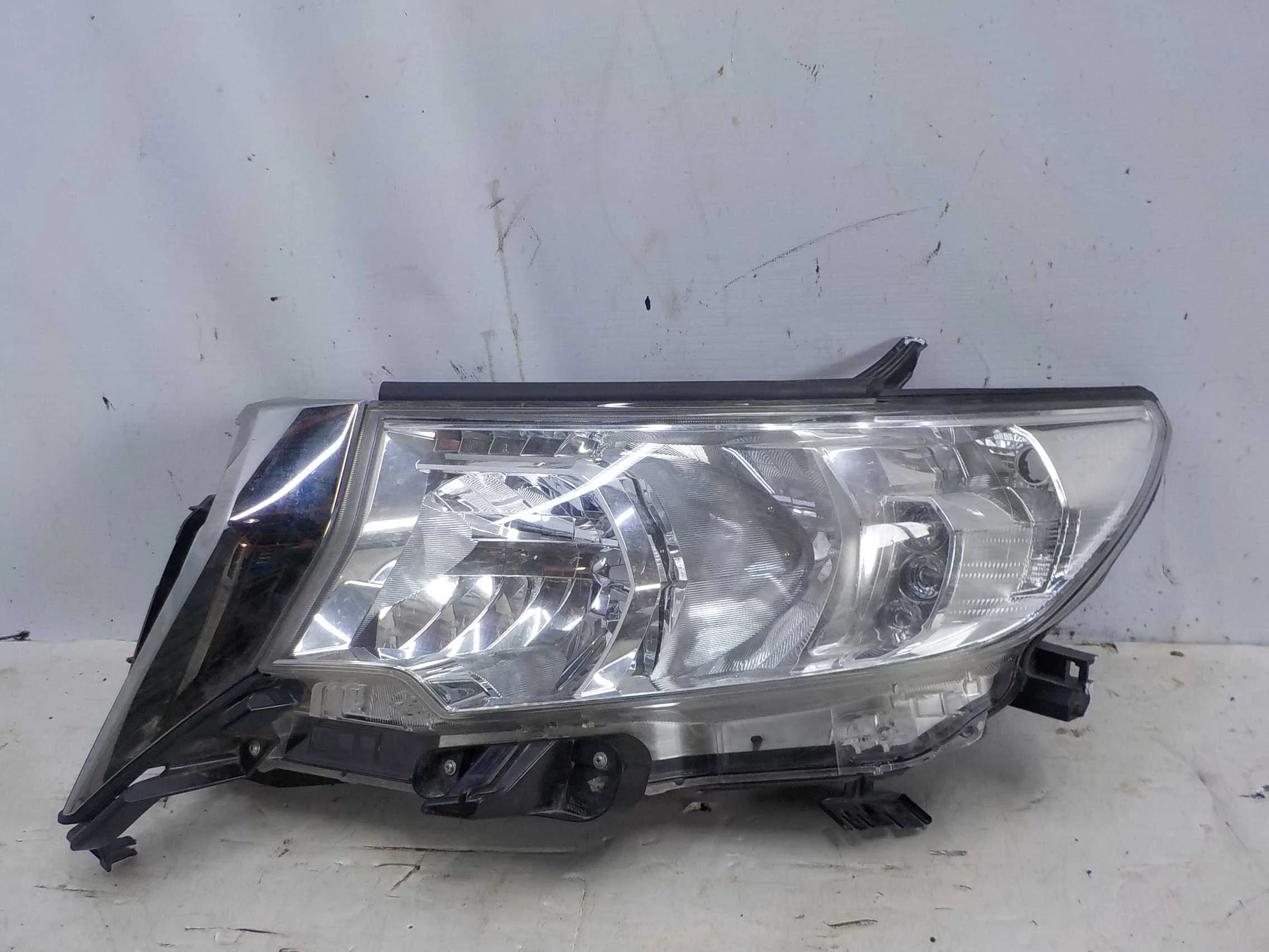 Фара Toyota Land Cruiser Prado 150 (2009—2013)  Лево