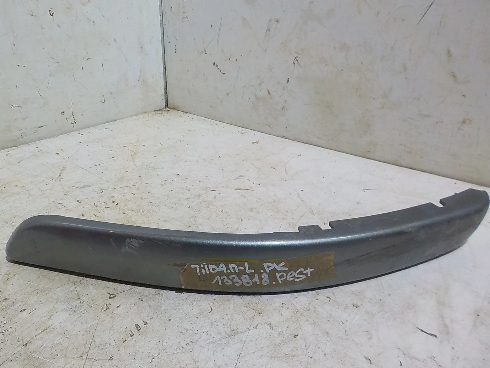 накладка на бампер Nissan Tiida C11 (2004—2012) Перед Лево