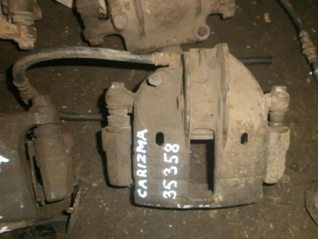 суппорт Mitsubishi Carisma I (1995—1999) Перед Право