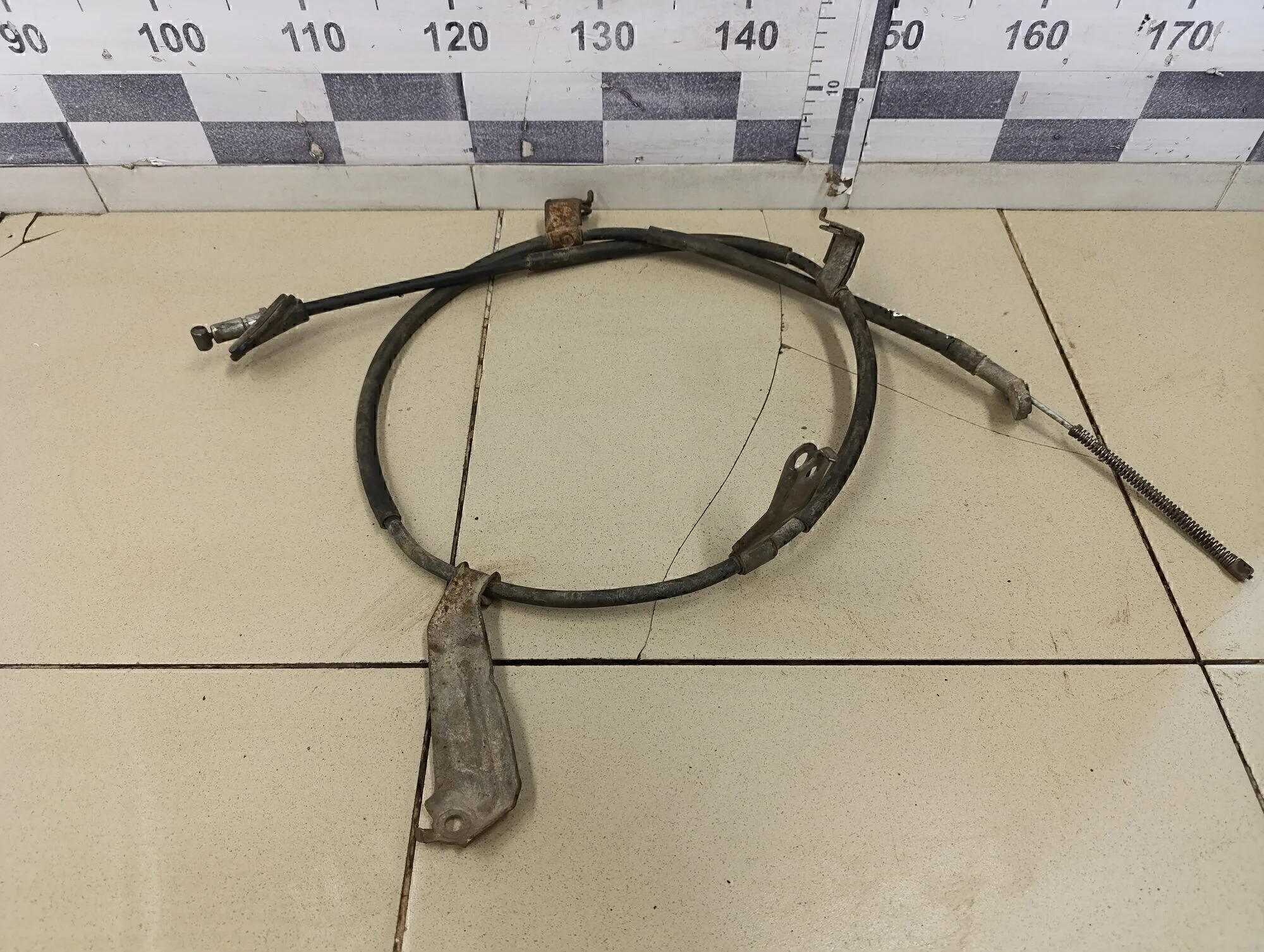 Трос стояночного тормоза левый CR-V 2007-2012