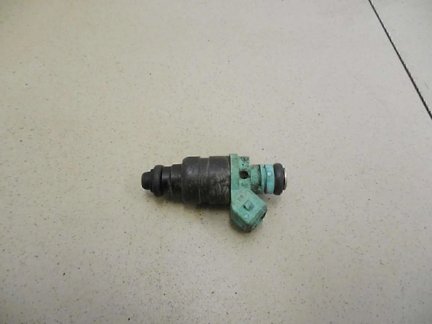 Форсунка инжекторная электрическая Rezzo 2005-2010