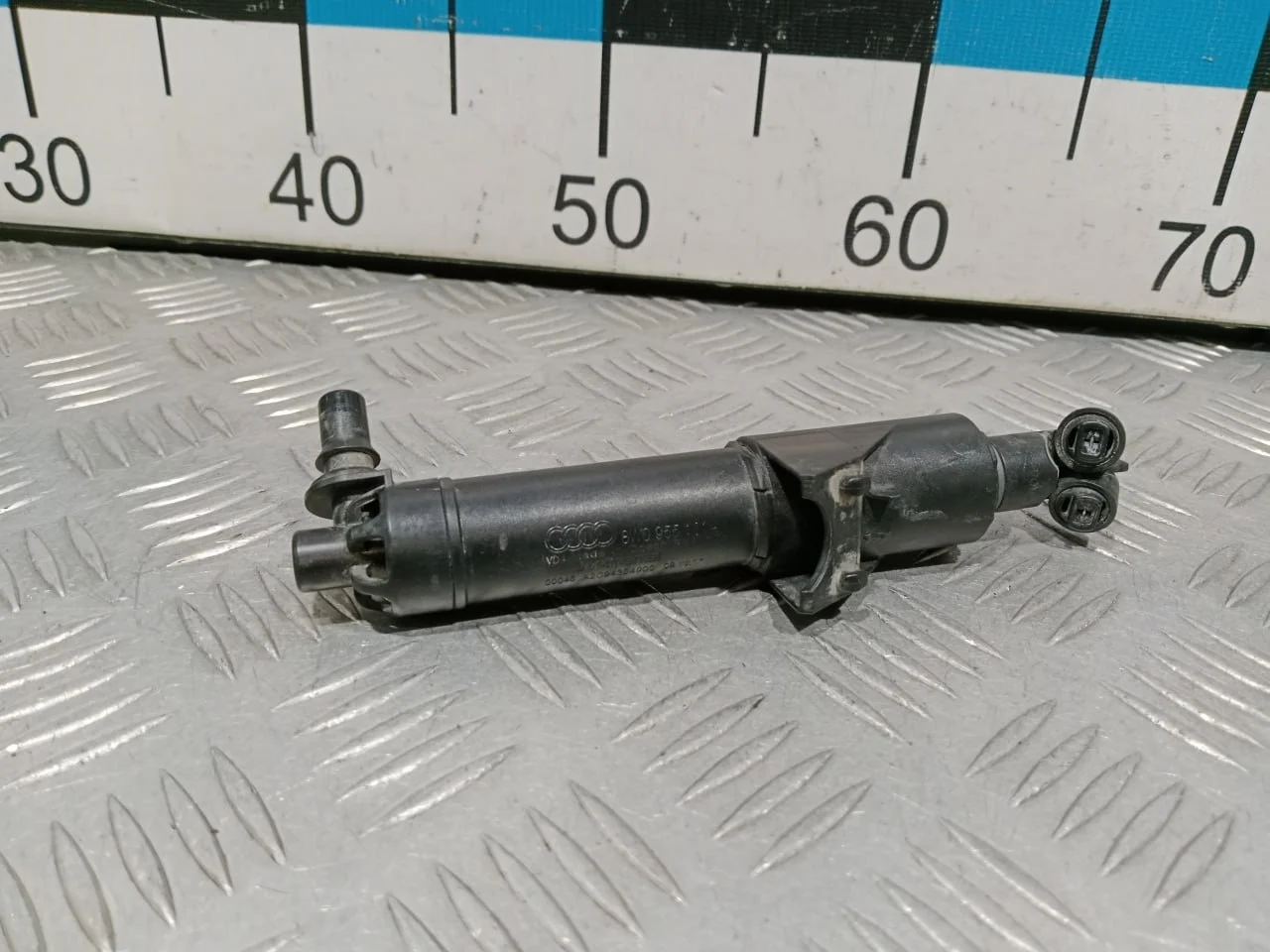 [Б/У] Форсунка омывателя фары левая [Код: 00670895 ]