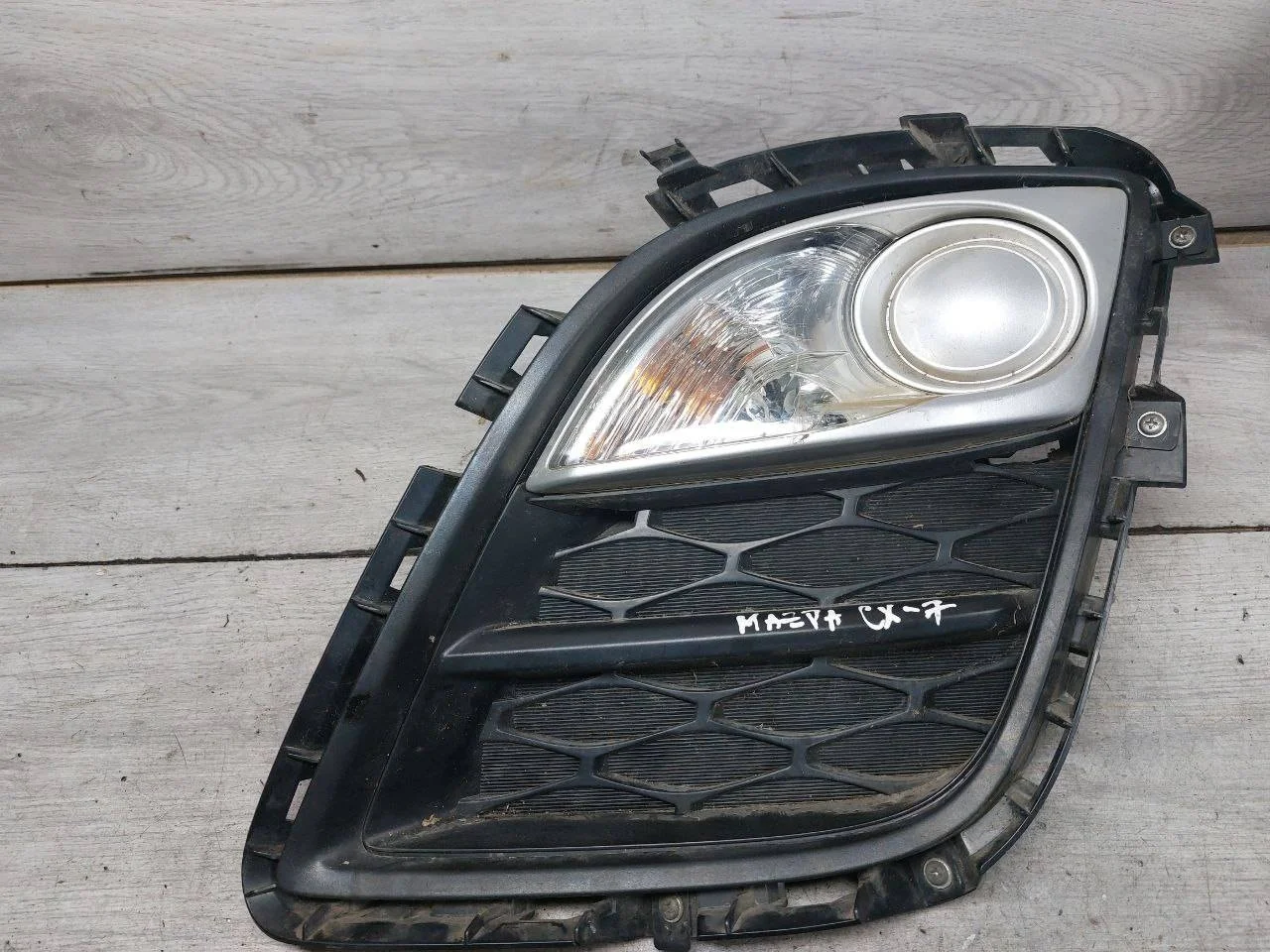 рамка фары противотуманной левая Mazda CX-7 ER