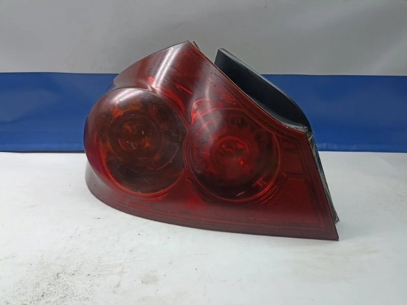 Фонарь Nissan Skyline 2006 26555JK000 PV36, задний левый