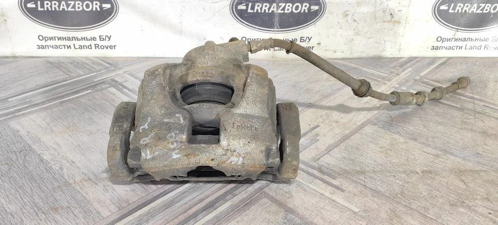Суппорт тормозной передний левый Land Rover Freelander II рестайлинг (2010—2012) 224DT