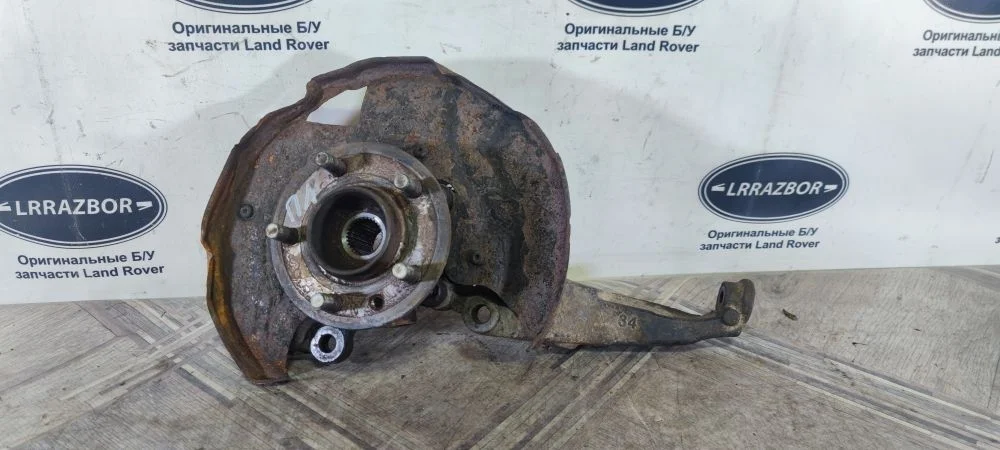 Кулак поворотный передний левый Land Rover Discovery III (2004—2009) 276DT