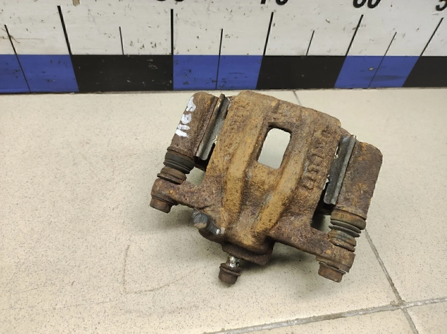 Суппорт передний правый Aveo (T200) 2003-2008