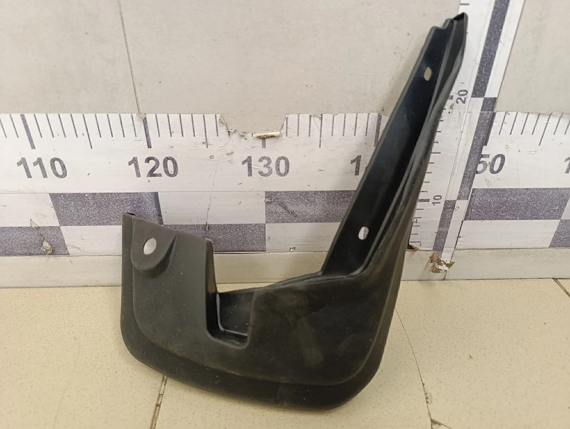 Брызговик передний Logan 2005-2014