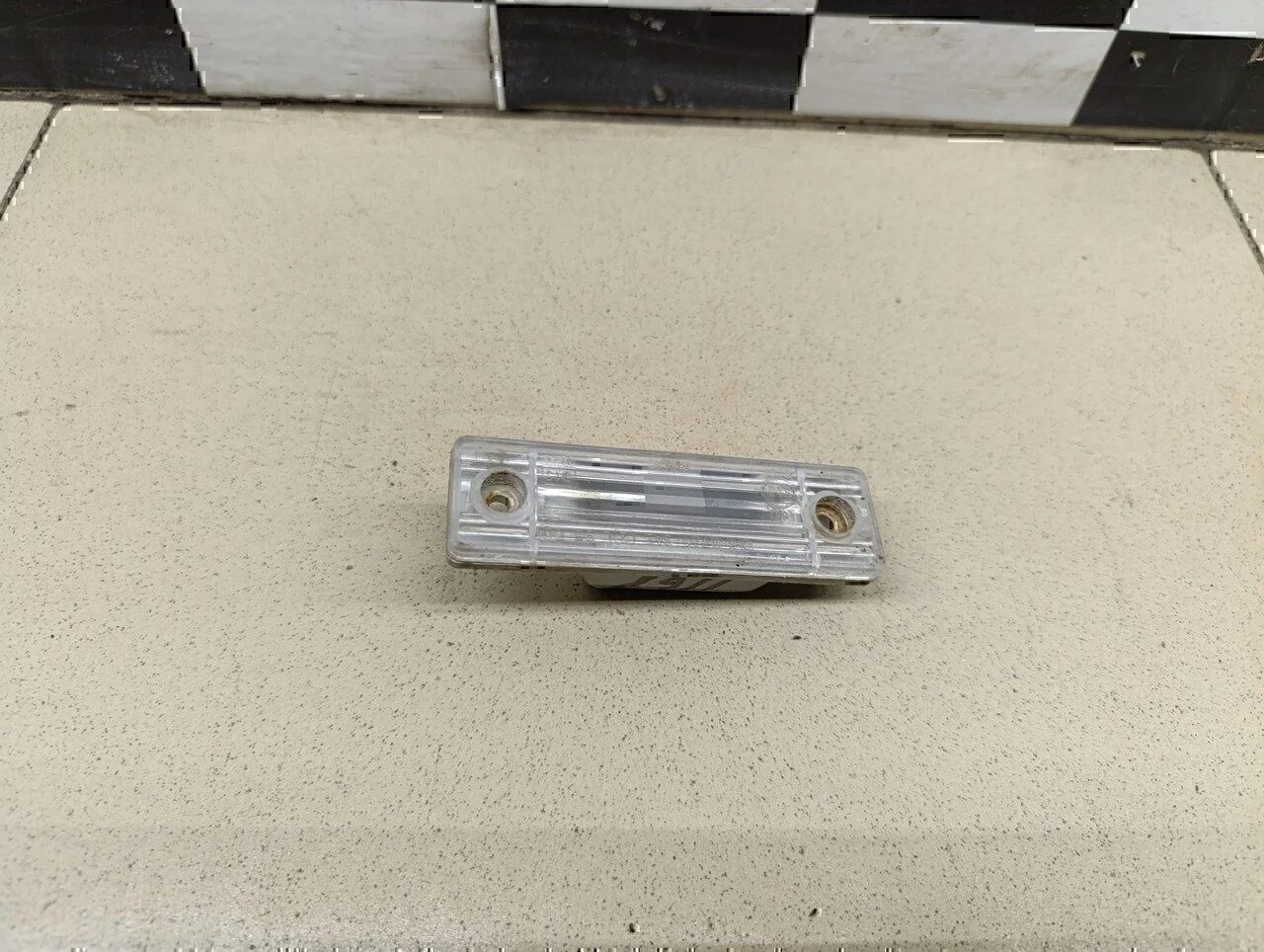 Фонарь подсветки номера Aveo (T200) 2003-2008