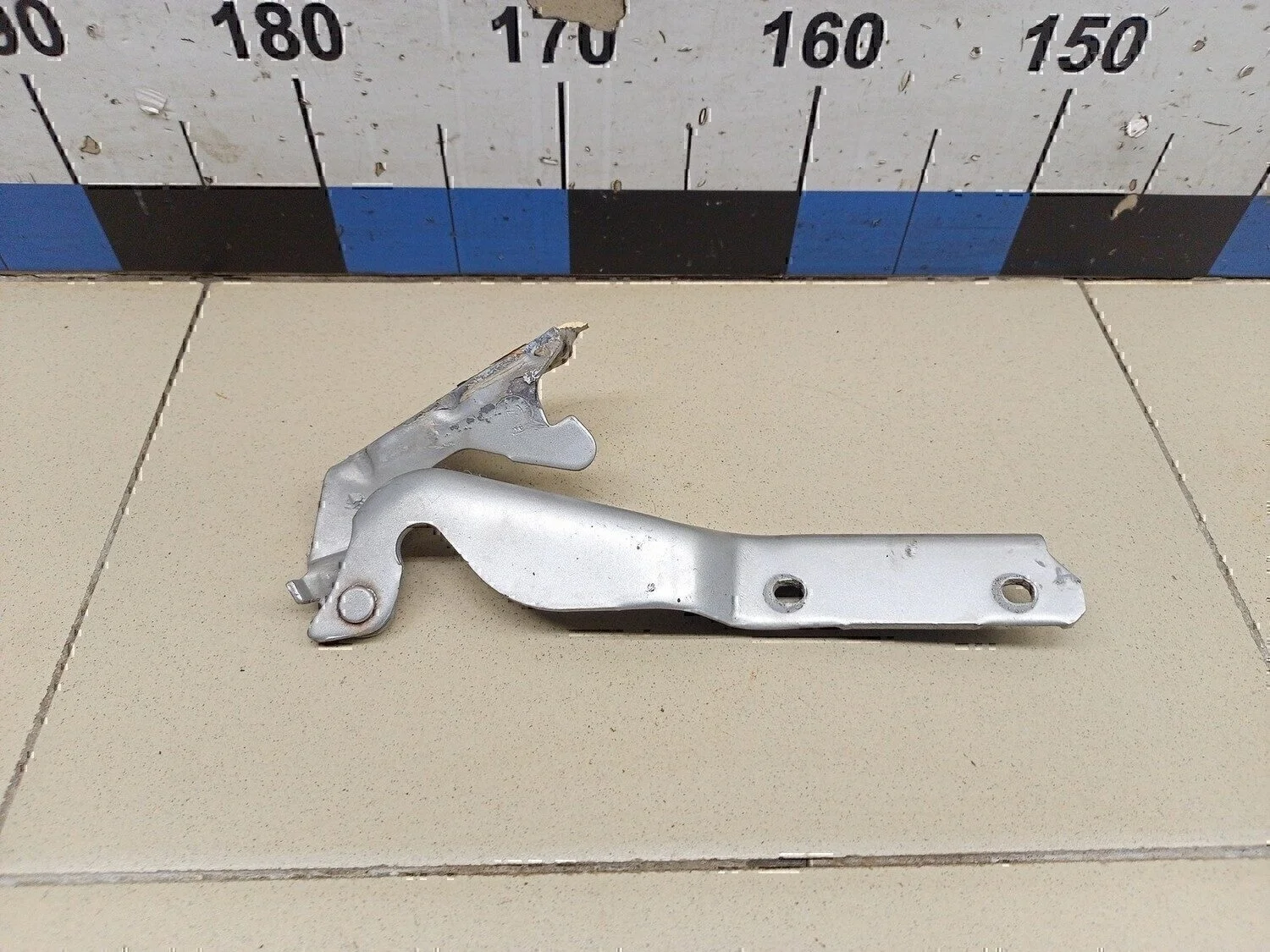 Петля капота левая Albea 2002-2012