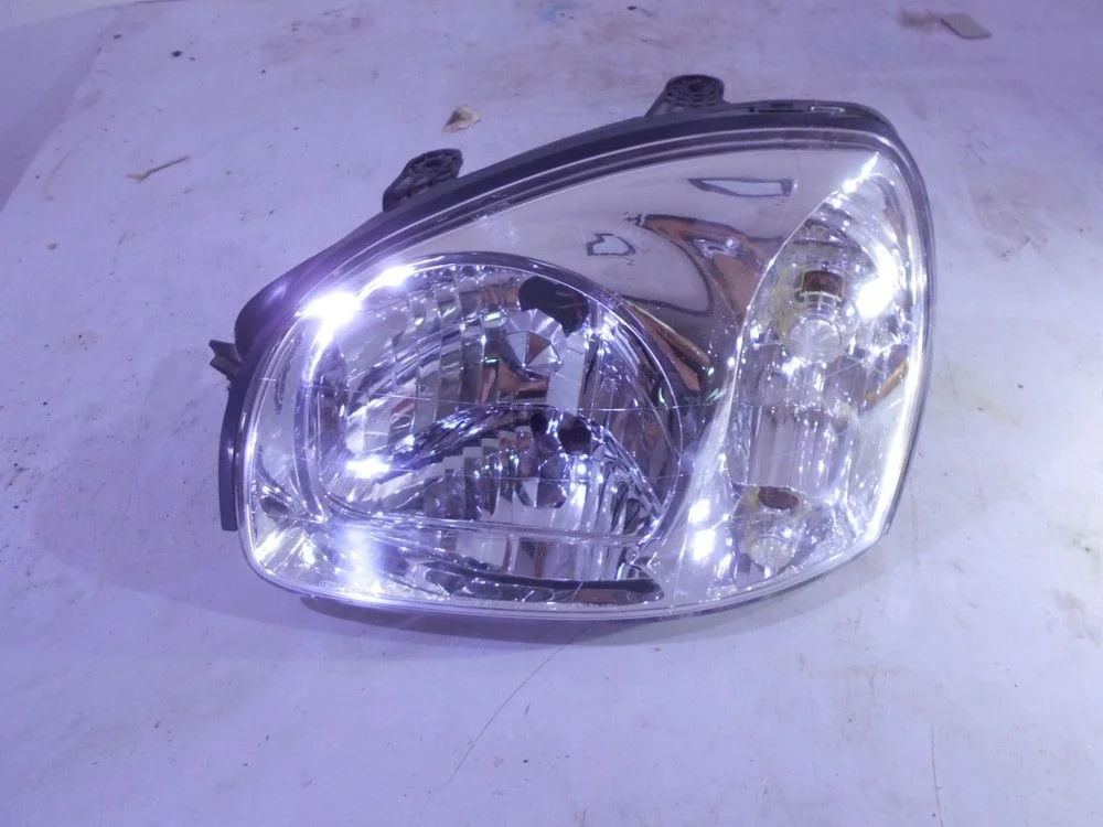 Фара левая Hyundai Santa Fe I (2000—2012)