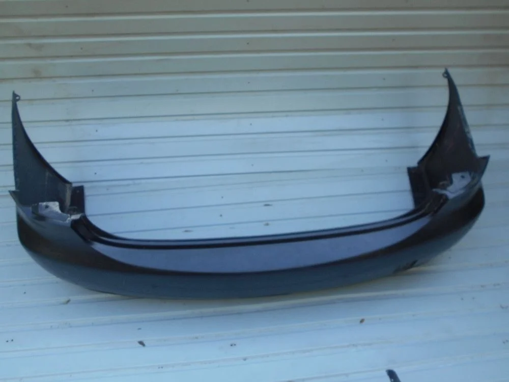 Бампер задний Nissan Almera N15 (1995—2000)