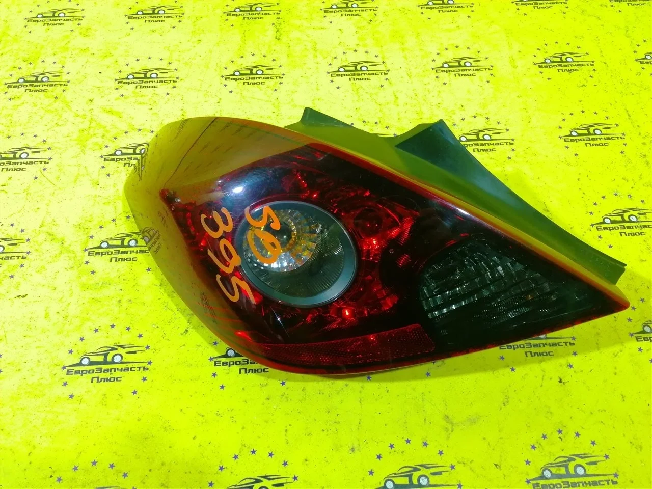 Фонарь Opel Corsa 13242813 D, задний левый