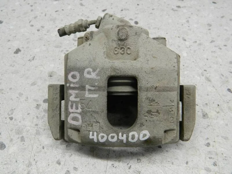 Суппорт передний правый Mazda Demio (DY) 2002-2007