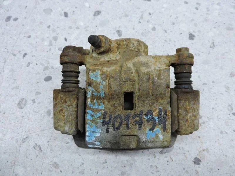 Суппорт задний левый Subaru Impreza (G12) 2007-2012