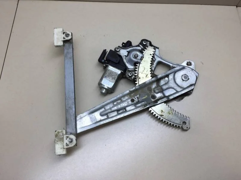 Стеклоподъемник электр. задний левый Nissan Tiida (C11) 2007-2014