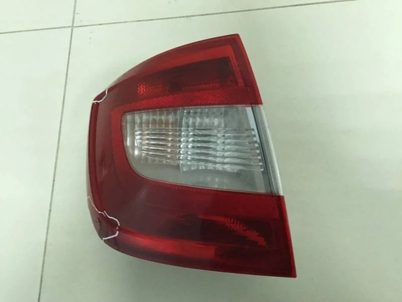 Фонарь задний левый Skoda Rapid 2012-2020