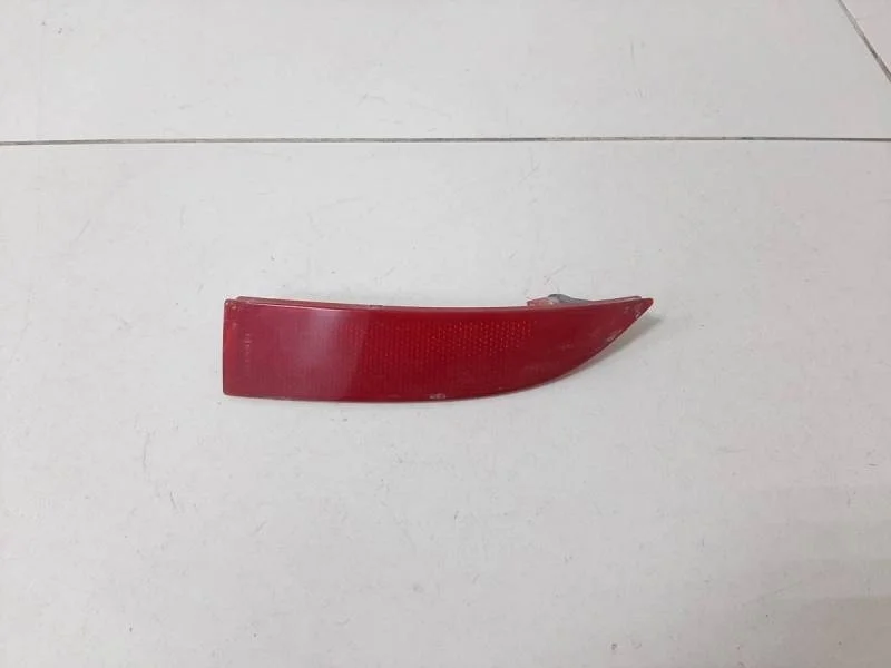 Отражатель в бампер задний левый Renault Logan (2) 2014>