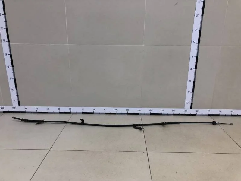 Трос стояночного тормоза левый Kia Ceed (JD) 2012-2018