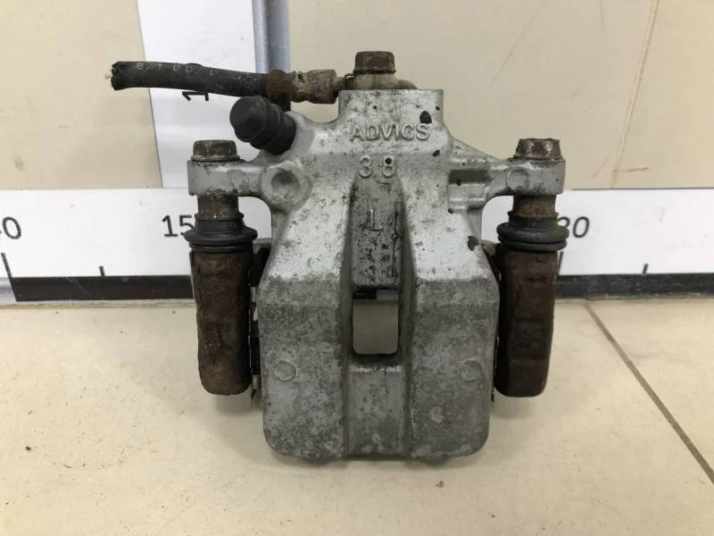 Суппорт задний левый Toyota Camry (V40) 2006-2011