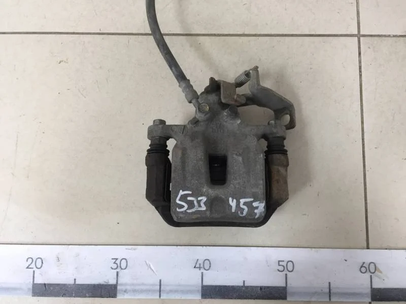 Суппорт задний правый Hyundai i30 (GD) 2012>