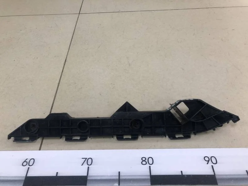 Кронштейн заднего бампера левый Toyota Corolla E150 2006-2013