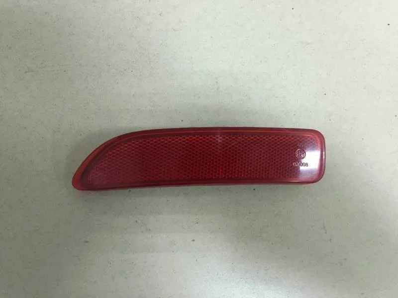 Отражатель в бампер задний левый Renault Logan (1) 2005-2014